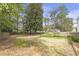 A large, fenced backyard offers privacy and space for outdoor activities at 1631 Dresden Ne Dr, Brookhaven, GA 30319