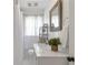 Bright bathroom features a shower and nice vanity at 1631 Dresden Ne Dr, Brookhaven, GA 30319