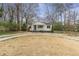 A charming bungalow-style home with a well-maintained yard and inviting curb appeal at 1631 Dresden Ne Dr, Brookhaven, GA 30319