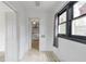 Bright laundry area with wood floors connects to the kitchen at 1631 Dresden Ne Dr, Brookhaven, GA 30319