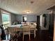 Dining room with seating for six people and hardwood floors at 184 Nathan Sw Rd, Atlanta, GA 30331