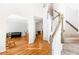 Inviting foyer with hardwood floors, staircase, and archway to living spaces at 8073 Ridge Vly, Woodstock, GA 30189