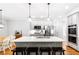 Modern kitchen featuring a large island, stainless steel appliances, and ample cabinetry at 8073 Ridge Vly, Woodstock, GA 30189