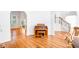 Open-concept living area with hardwood floors and views to other rooms at 8073 Ridge Vly, Woodstock, GA 30189