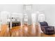 Spacious living area with hardwood floors and an open layout at 8073 Ridge Vly, Woodstock, GA 30189