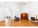 Bright living room with hardwood floors, fireplace, and ample natural light at 8073 Ridge Vly, Woodstock, GA 30189