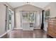Bedroom featuring dark wood floors, large windows, and lots of natural light at 217 Springs Xing, Canton, GA 30114