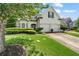Lovely home boasting manicured landscaping, a spacious driveway, and an inviting facade with a two-car garage at 217 Springs Xing, Canton, GA 30114