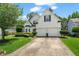 Charming two-story home with a well-manicured lawn and a two-car garage, perfect for Gathering living at 217 Springs Xing, Canton, GA 30114