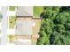 A bird's eye view of a home with a fenced backyard adjacent to a wooded area, showcasing privacy at 2844 Bluestone Sw Dr, Atlanta, GA 30331