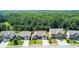 Expansive aerial view showing multiple homes, their layouts and beautiful landscaping with lush greenery at 2844 Bluestone Sw Dr, Atlanta, GA 30331