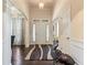 Elegant foyer with hardwood floors, high ceilings, and decorative molding at 2844 Bluestone Sw Dr, Atlanta, GA 30331
