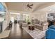 Spacious living room with a fireplace, built-in shelving, and open floor plan at 2844 Bluestone Sw Dr, Atlanta, GA 30331