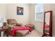 Comfortable sitting area with plush recliner, reading lamp, and soft rug at 2844 Bluestone Sw Dr, Atlanta, GA 30331