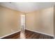 Bright bedroom features wood-look floors and neutral walls, creating a warm and inviting space at 3835 Conley Downs Dr, Decatur, GA 30034