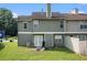 Townhome featuring a backyard patio area and rear exterior at 3835 Conley Downs Dr, Decatur, GA 30034