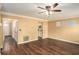 Inviting living room featuring beautiful wood floors and easy access to other rooms at 3835 Conley Downs Dr, Decatur, GA 30034