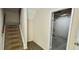 View of stairs to the unfinished basement at 5595 Marbut Rd, Lithonia, GA 30058