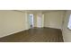 Bedroom featuring vinyl flooring, closet, and natural light at 5595 Marbut Rd, Lithonia, GA 30058