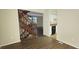 Open-concept living area with stairs, a view of the kitchen, and seamless floor transition at 5595 Marbut Rd, Lithonia, GA 30058