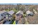 An aerial view showcasing the neighborhood with well-maintained homes and mature trees at 2108 Main Nw St, Atlanta, GA 30318