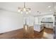 Cozy dining room next to an adjacent kitchen at 2108 Main Nw St, Atlanta, GA 30318