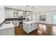 Bright, updated kitchen with stainless steel appliances, quartz countertops, and large island at 2108 Main Nw St, Atlanta, GA 30318