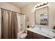 Full bathroom with shower and tub, vanity and mirror, and neutral color palette at 3898 High Dove Sw Way # 12, Smyrna, GA 30082