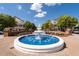 Beautiful water fountain surrounded by trees and residences in the community at 3898 High Dove Sw Way # 12, Smyrna, GA 30082
