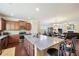 Open-concept kitchen with a large island, stainless steel appliances, and hardwood floors at 3898 High Dove Sw Way # 12, Smyrna, GA 30082