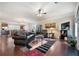 Inviting living room with hardwood floors, fireplace, and open layout to kitchen at 3898 High Dove Sw Way # 12, Smyrna, GA 30082