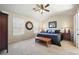 Sunlit primary bedroom with vaulted ceiling, plush carpet, and neutral color palette at 3898 High Dove Sw Way # 12, Smyrna, GA 30082