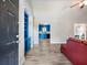 Inviting home entryway featuring hardwood floors, and a view into the kitchen at 443 Rhett Dr, Loganville, GA 30052