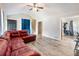 Open living space with hardwood floors and views into the entry and dining area at 443 Rhett Dr, Loganville, GA 30052