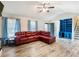 Spacious living room featuring lots of natural light and hardwood floors at 443 Rhett Dr, Loganville, GA 30052