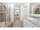 Bright bathroom with a glass-enclosed shower and a view of the bedroom at 865 Athena Bnd, Fairburn, GA 30213