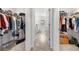 Well-organized walk-in closet providing access to the main bathroom at 865 Athena Bnd, Fairburn, GA 30213