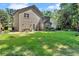 Large, grassy backyard, ideal for outdoor activities, surrounding the house at 1481 Howard Way, Lawrenceville, GA 30043