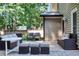 Outdoor patio area with stylish wicker furniture, providing a relaxing space for entertaining guests at 1481 Howard Way, Lawrenceville, GA 30043