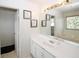 Bright bathroom showcasing a bathtub, a toilet, and a sink with a mirror for convenience at 2397 Planters Cove Dr, Lawrenceville, GA 30044