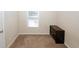 Bedroom with neutral colored walls, carpeted floors, and natural light creating a cozy space at 2397 Planters Cove Dr, Lawrenceville, GA 30044
