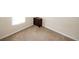 Standard empty bedroom with natural light, neutral colored walls, and carpeted floors at 2397 Planters Cove Dr, Lawrenceville, GA 30044