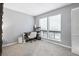 Neutral bedroom with carpet, natural light, and ample closet space at 102 Oak Pl, Villa Rica, GA 30180