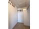 Walk-in closet with a shelf and rod for hanging clothing at 2285 Peachtree Ne Rd # 1202, Brookhaven, GA 30309