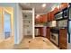Small kitchen featuring updated stainless steel appliances and neutral colored walls at 2285 Peachtree Ne Rd # 1202, Brookhaven, GA 30309