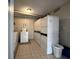 On-site laundry room with multiple washers and dryers for convenience at 2285 Peachtree Ne Rd # 1202, Brookhaven, GA 30309