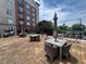 Rooftop terrace with dining sets and shade umbrellas for outdoor relaxation at 2285 Peachtree Ne Rd # 1202, Brookhaven, GA 30309
