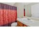 Bathroom featuring a vanity with a sink, mirror, and a shower with a stylish curtain at 12303 Waldrop Pl, Decatur, GA 30034