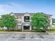 Apartment complex features an attractive exterior with well-maintained landscaping and ample parking space at 12303 Waldrop Pl, Decatur, GA 30034