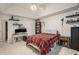 Spacious bedroom with a vaulted ceiling, decorative shelves, and a comfortable layout at 304 Bennett Farms Ct, Acworth, GA 30102